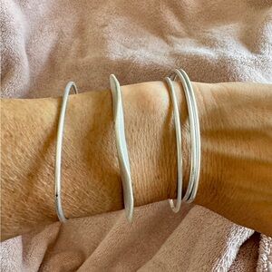 5 silver bangles